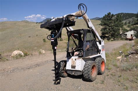 skid steer post hole digger attachment|auger attachments for skid steers.